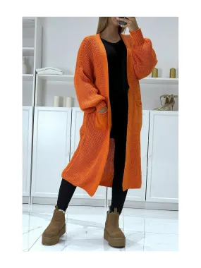 Gilet long orange à manches bouffantes à grosse maille