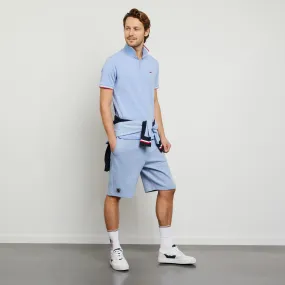 Polo uni en coton bleu clair